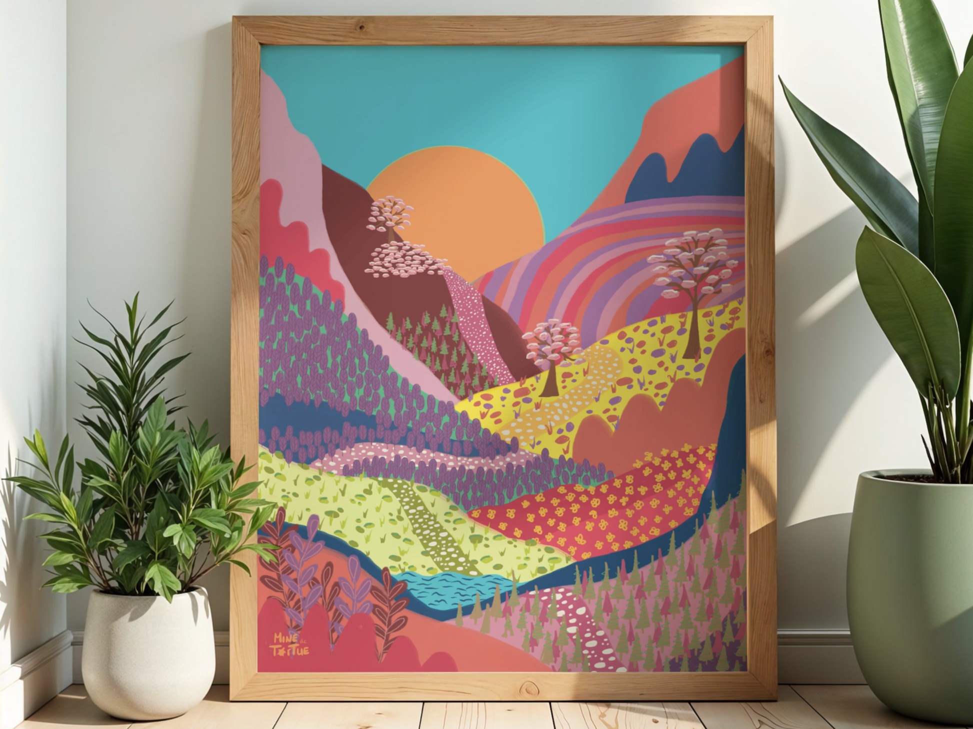 Poster Colourful Mountains by sunset with warm tones in oak frame on wooden floor next to plants