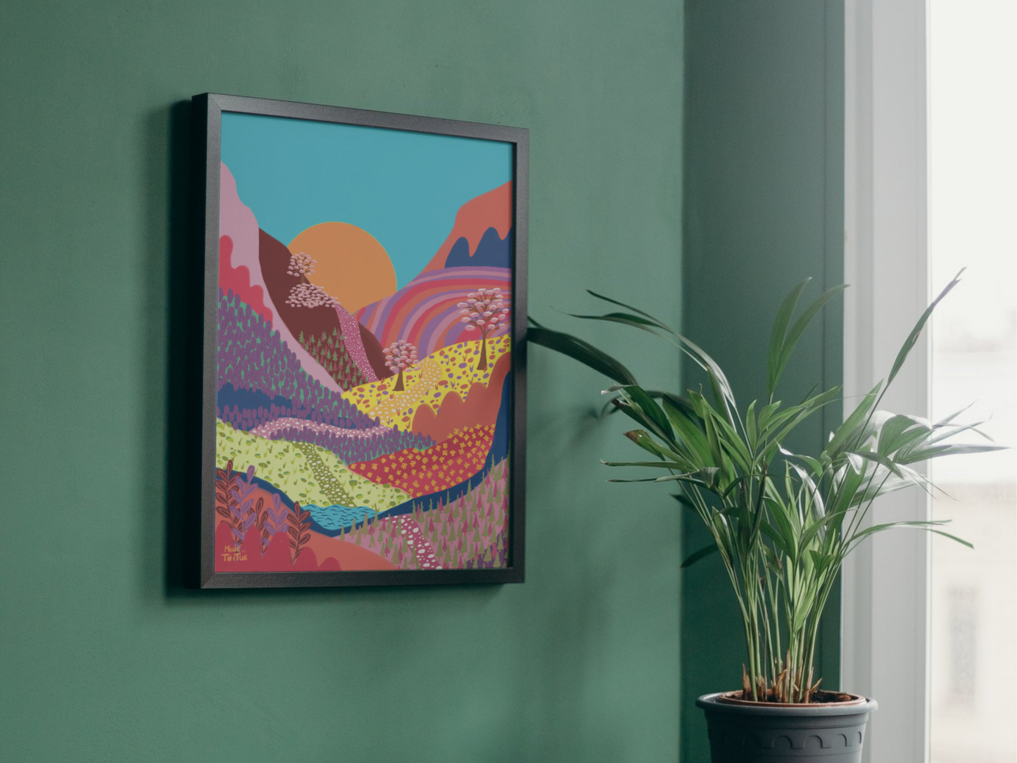 Poster Colourful Mountains by sunset with warm tones in black frame hanging on green wall
